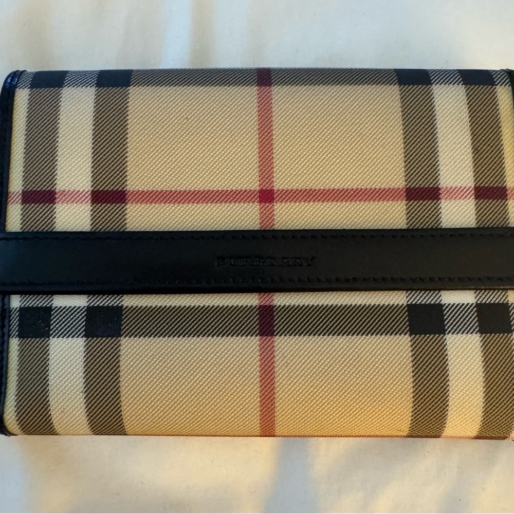 Burberry bifold wallet with classic Nova Check pattern